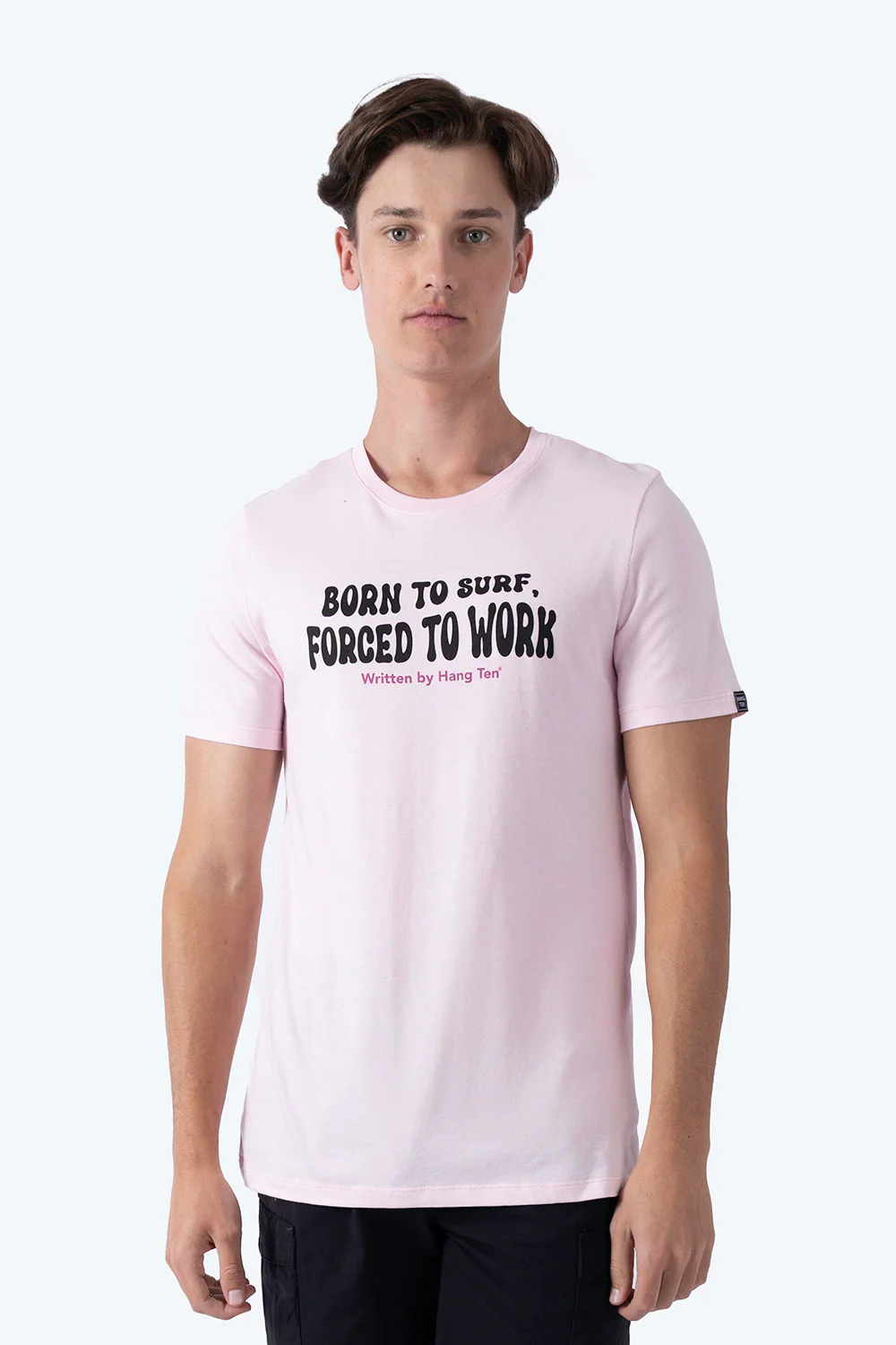 T-shirt rosa claro "Born to surf, forced to work"