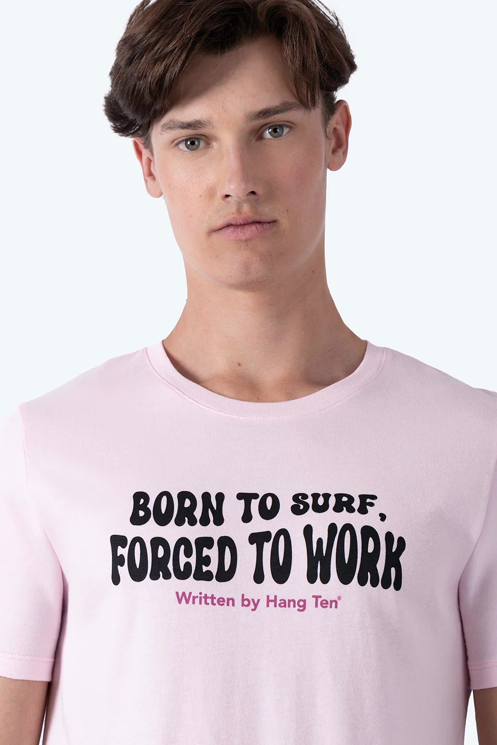 T-shirt rosa claro "Born to surf, forced to work" - Imagen 3