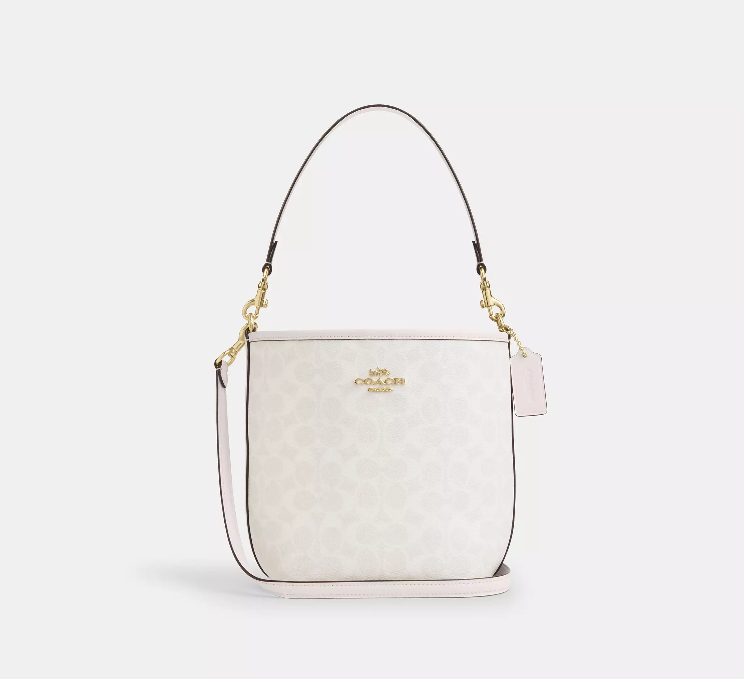 Coach bucket City Small en lona de firma Blanca